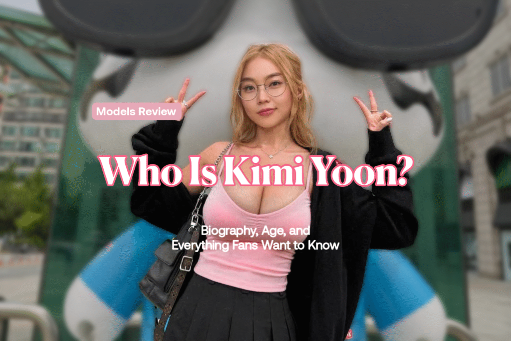 Kimi Yoon posing in a pink top with glasses, peace sign, featured image for biography and background article.