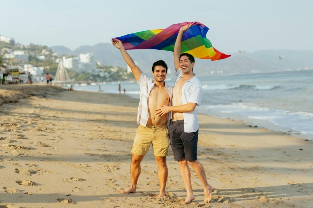a couple standing on the shore